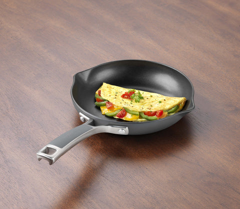 Calphalon Easy System 8in omelette pan with silicone handle for a cool, secure grip.