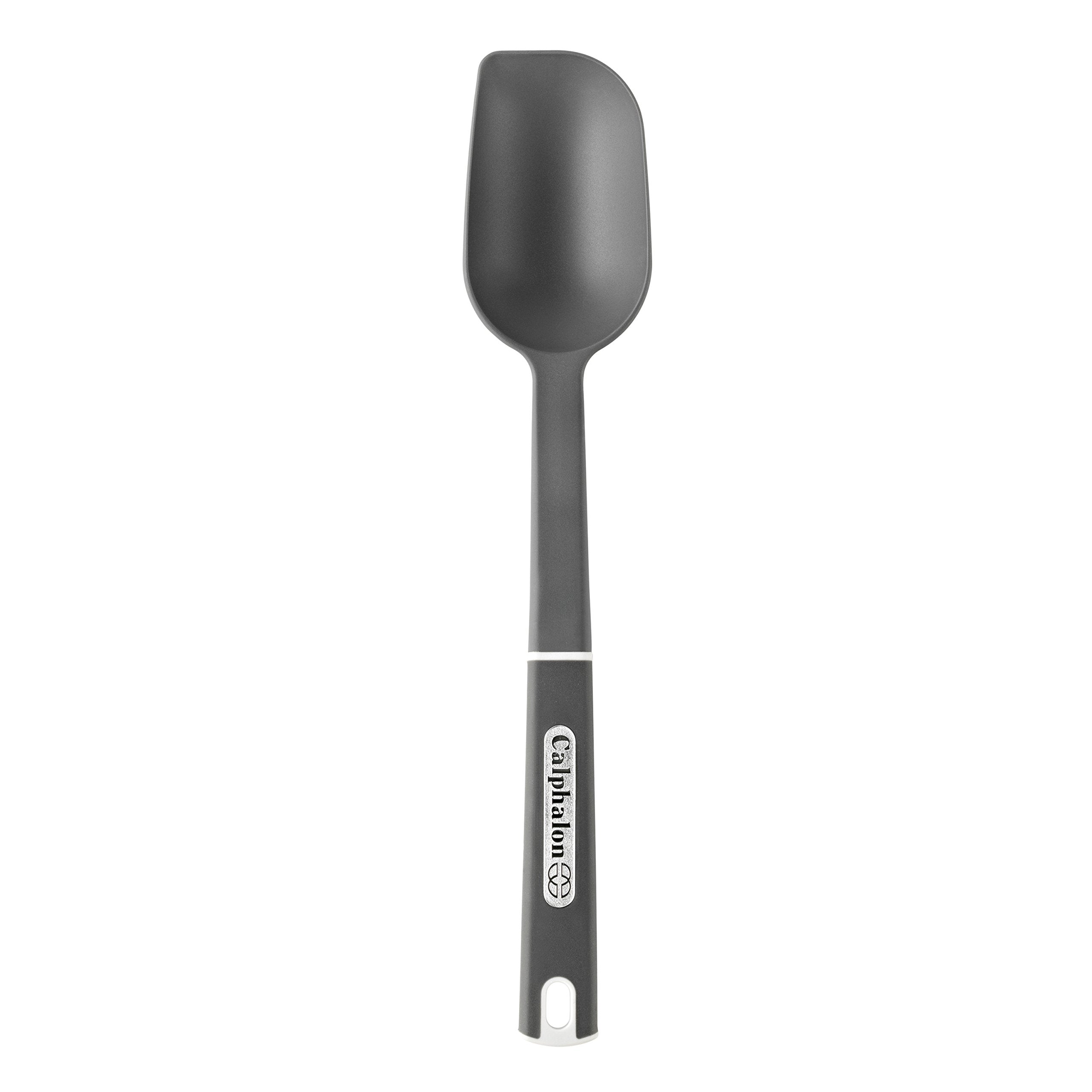 Calphalon nylon solid spoon large in use, scraping and stirring safely, heat resistant up to 400°F