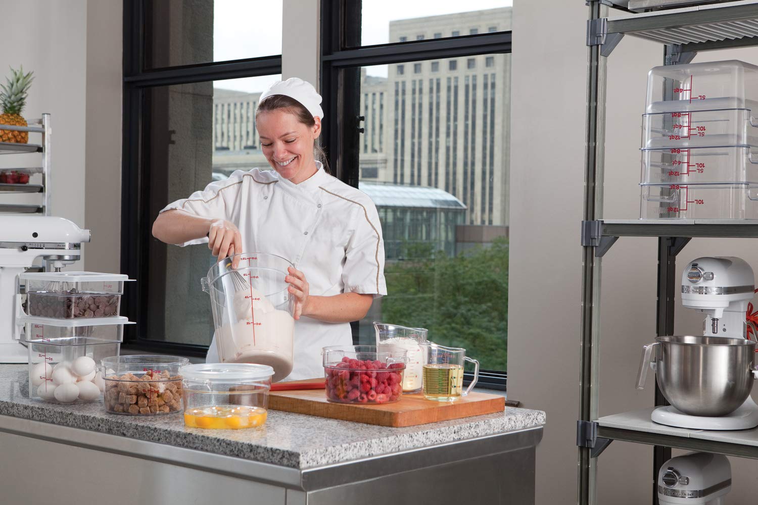 Cambro 1 Quart Clear measure cup, side-handle view, durable ergonomic design for daily kitchen use.