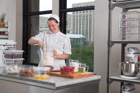 Cambro 1 Quart Clear measure cup, side-handle view, durable ergonomic design for daily kitchen use.