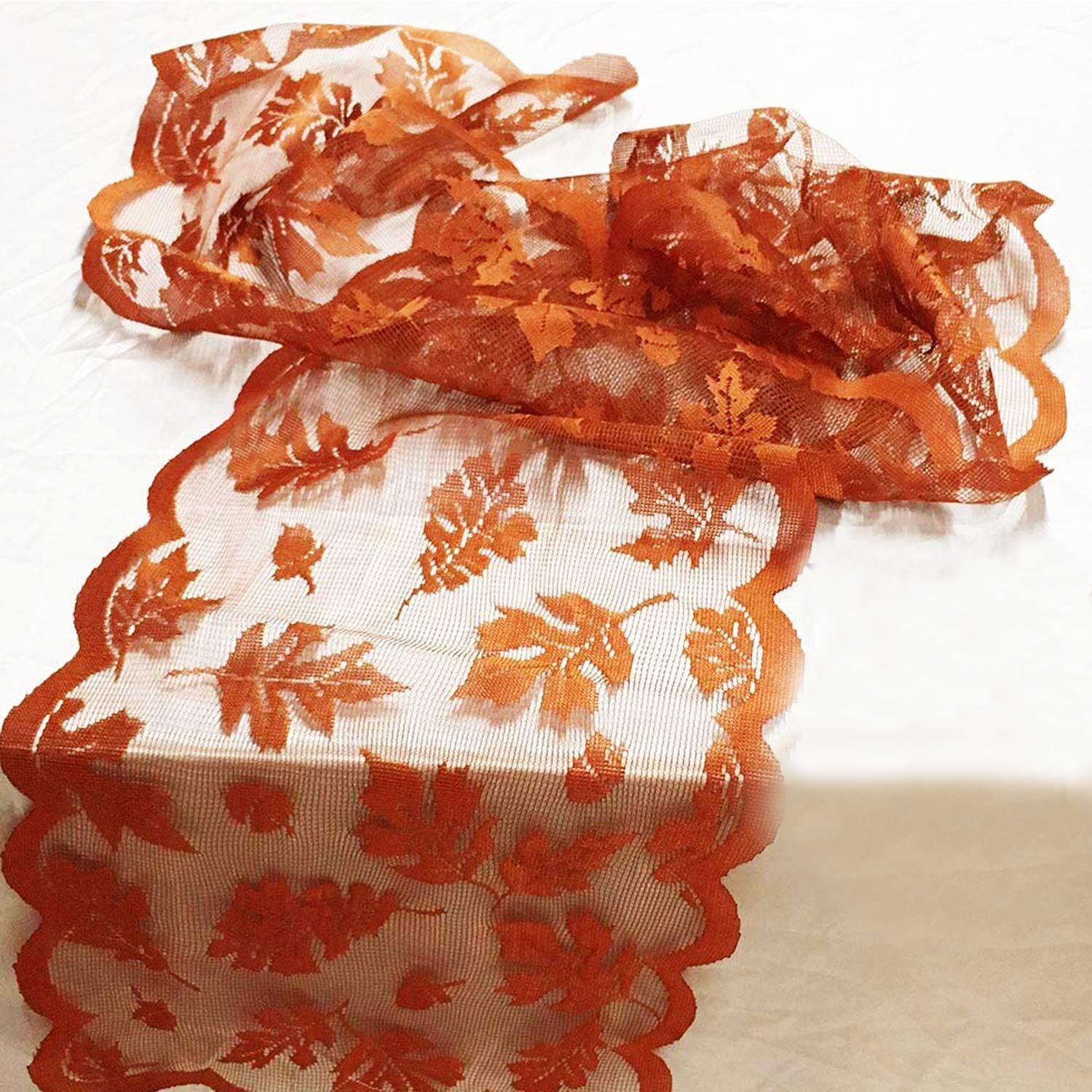 Camlinbo maple leaves table runner with brown lace, adding warm Thanksgiving ambiance.