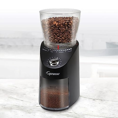Capresso Infinity Plus gear reduction motor powering cooler grinding and better aroma preservation.