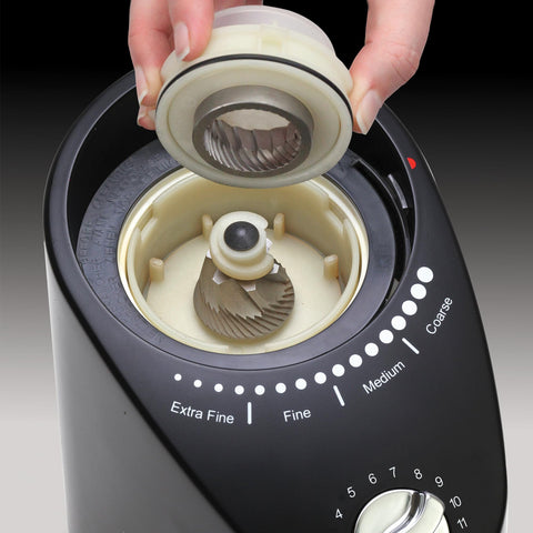 Capresso Infinity Plus in Black on a modern kitchen counter, compact and quiet.