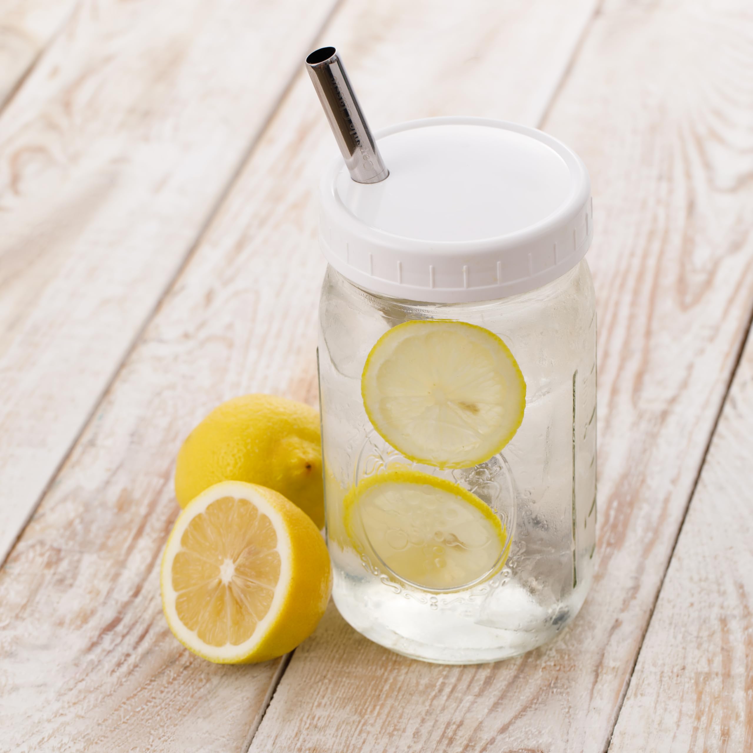 Capsule Classic white plastic lids prevent spills during travel