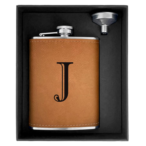 CARAKNOTS hip flask with leather exterior and engraved initials for a personalized gift.
