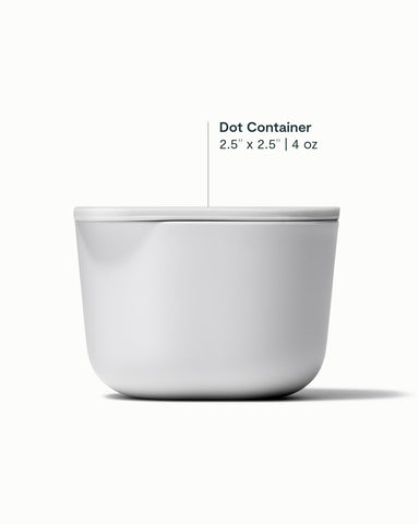 Caraway Dot Inserts shown inside glass containers for organized on-the-go meals.