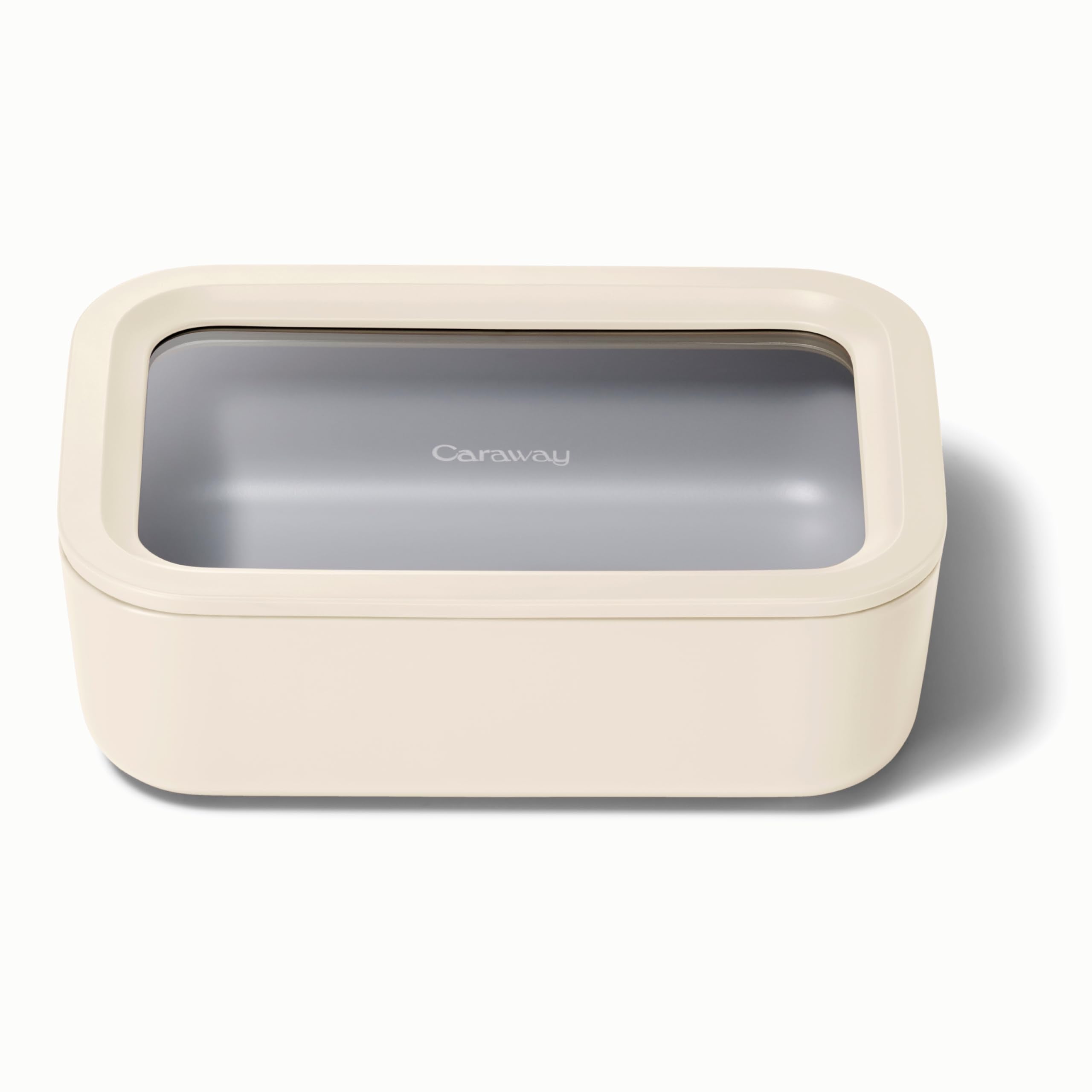Caraway glass storage six point six cup container with clear lid for leftovers.