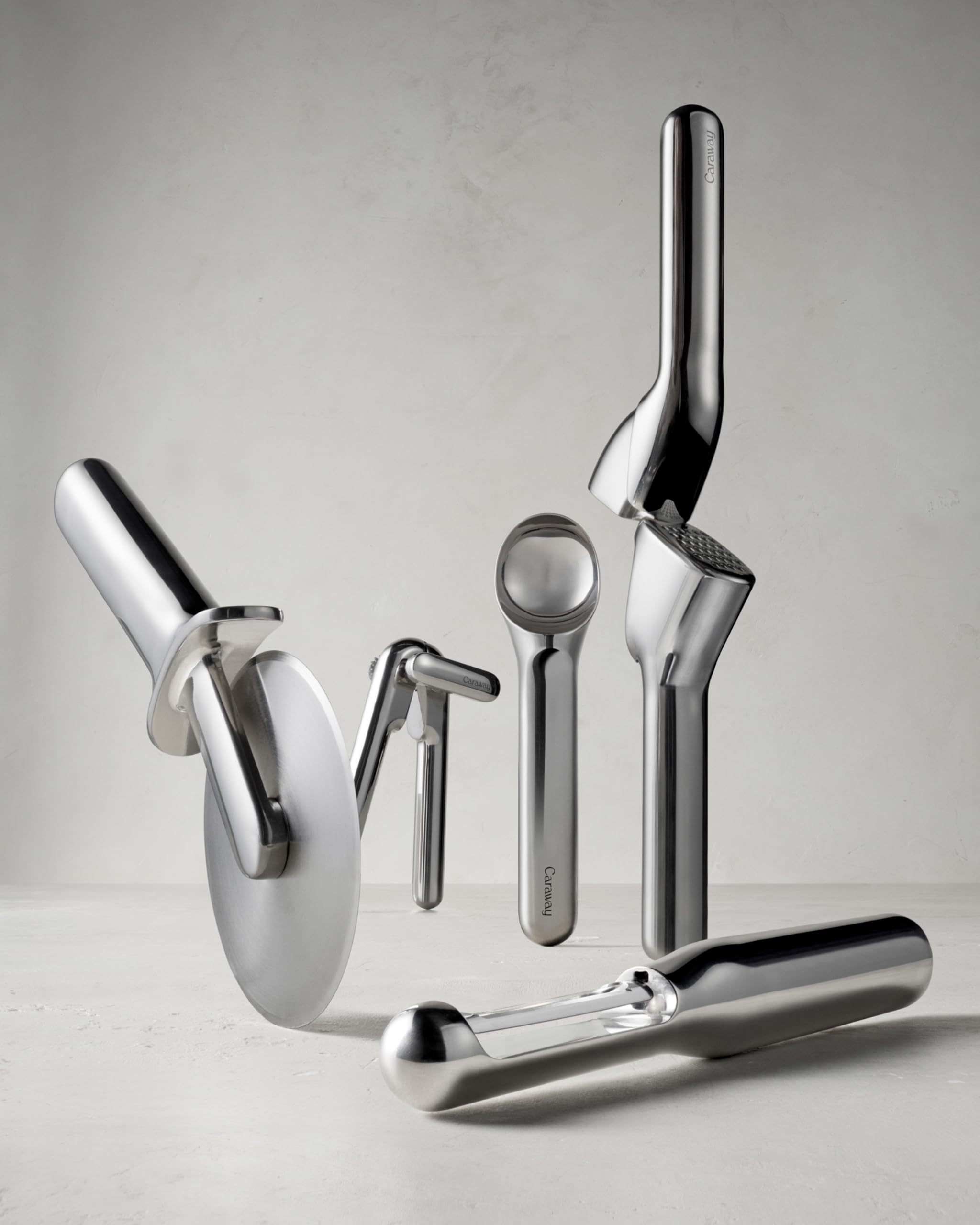 Caraway ice cream scoop on counter highlights stylish, non-toxic stainless steel.