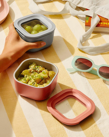 Caraway oven-microwave safe glass container ready for reheating