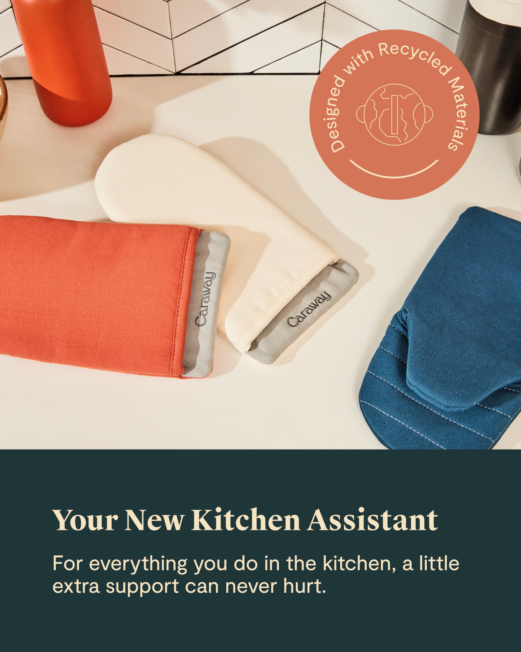Cream mitts in use for hot pan transfers.