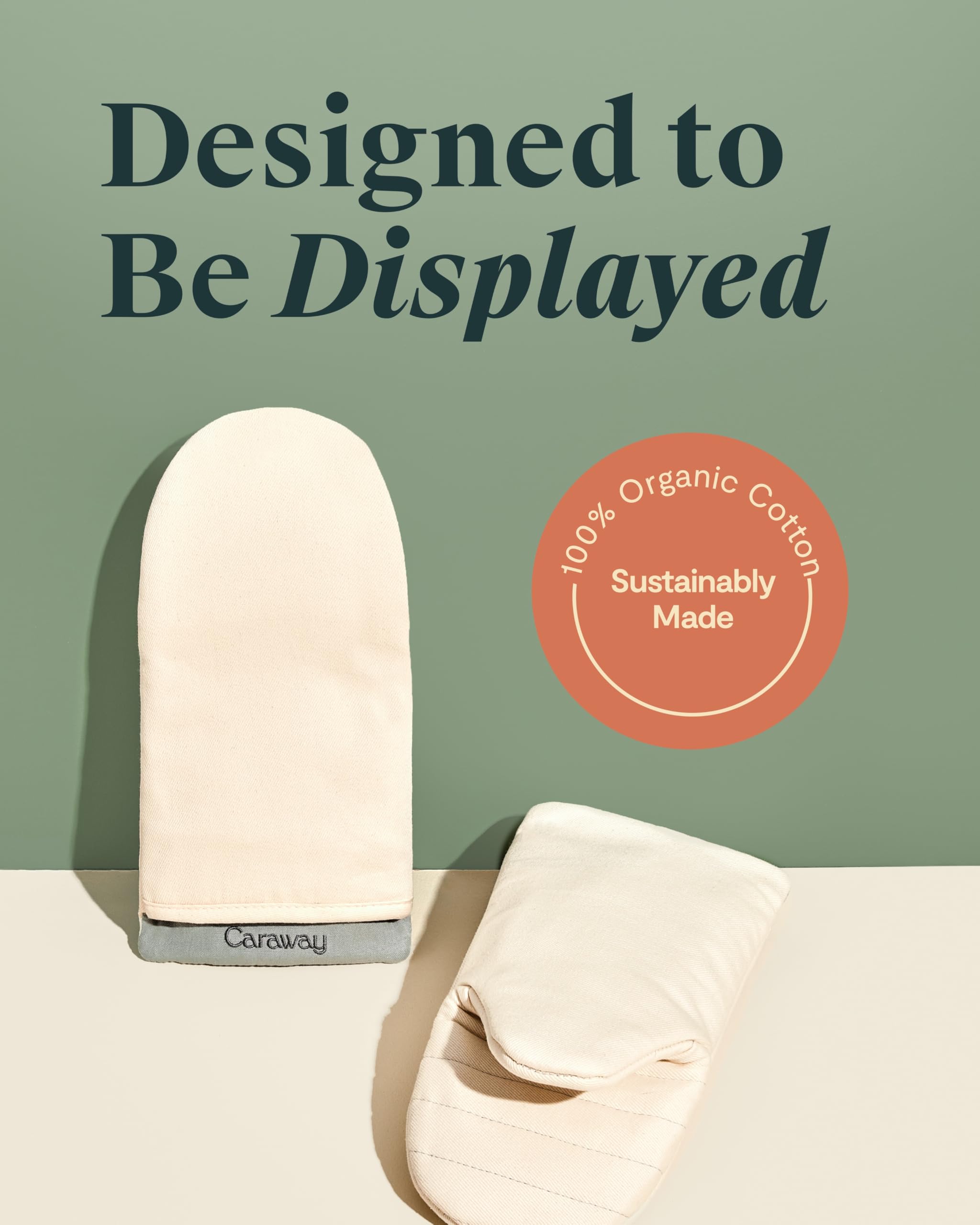 Caraway oven mitts cream set of 2 on display with coordinated kitchen colors.