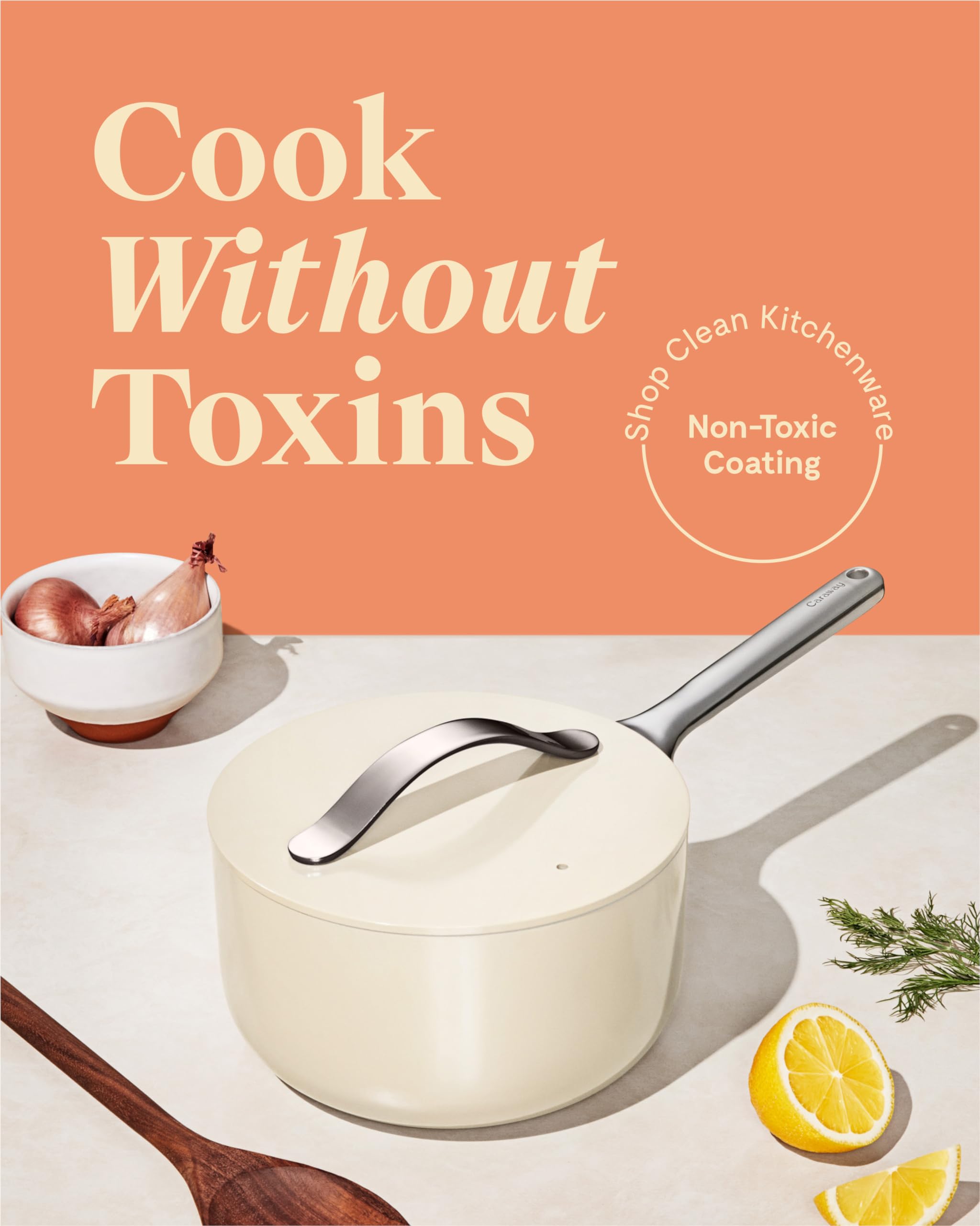 Ergonomic gray exterior and handle on Caraway pan for comfortable grip during cooking.