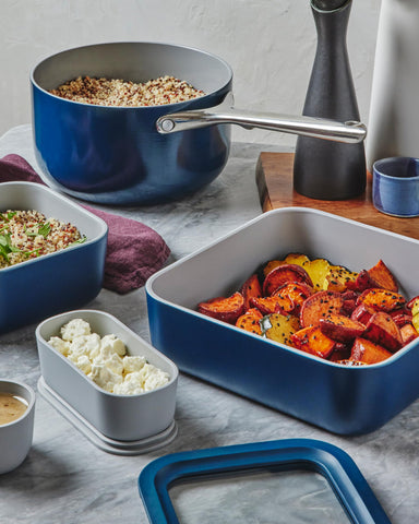 Caraway square navy lid design supports spill-free lunch packing.