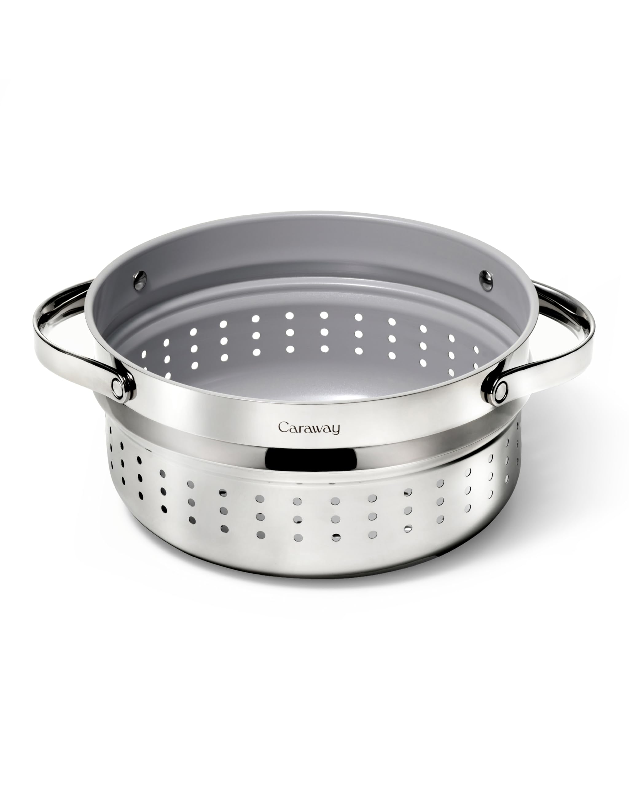 Caraway steamer inside a Dutch oven showing spacious capacity for family meals.