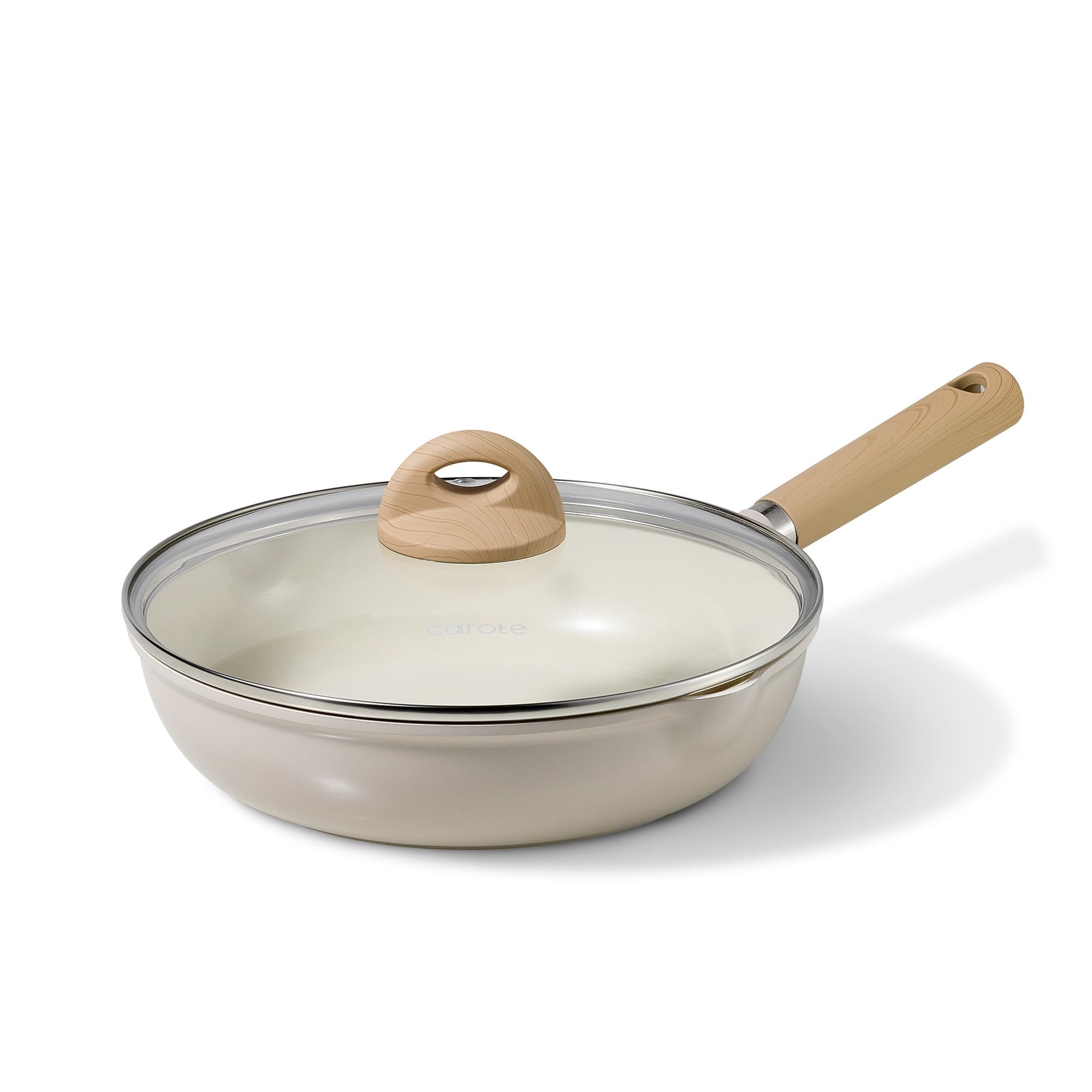 CAROTE 10-inch ceramic frying pan with lid in taupe, showing nonstick surface for easy cooking