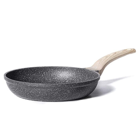 CAROTE 12-inch black skillet complements eggs, pancakes, and sautéed vegetables