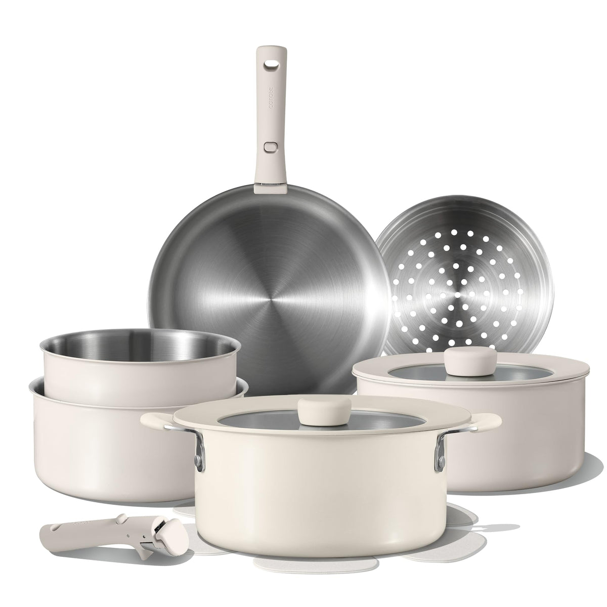 CAROTE 14-piece set with detachable handles for compact storage and versatile cooking.