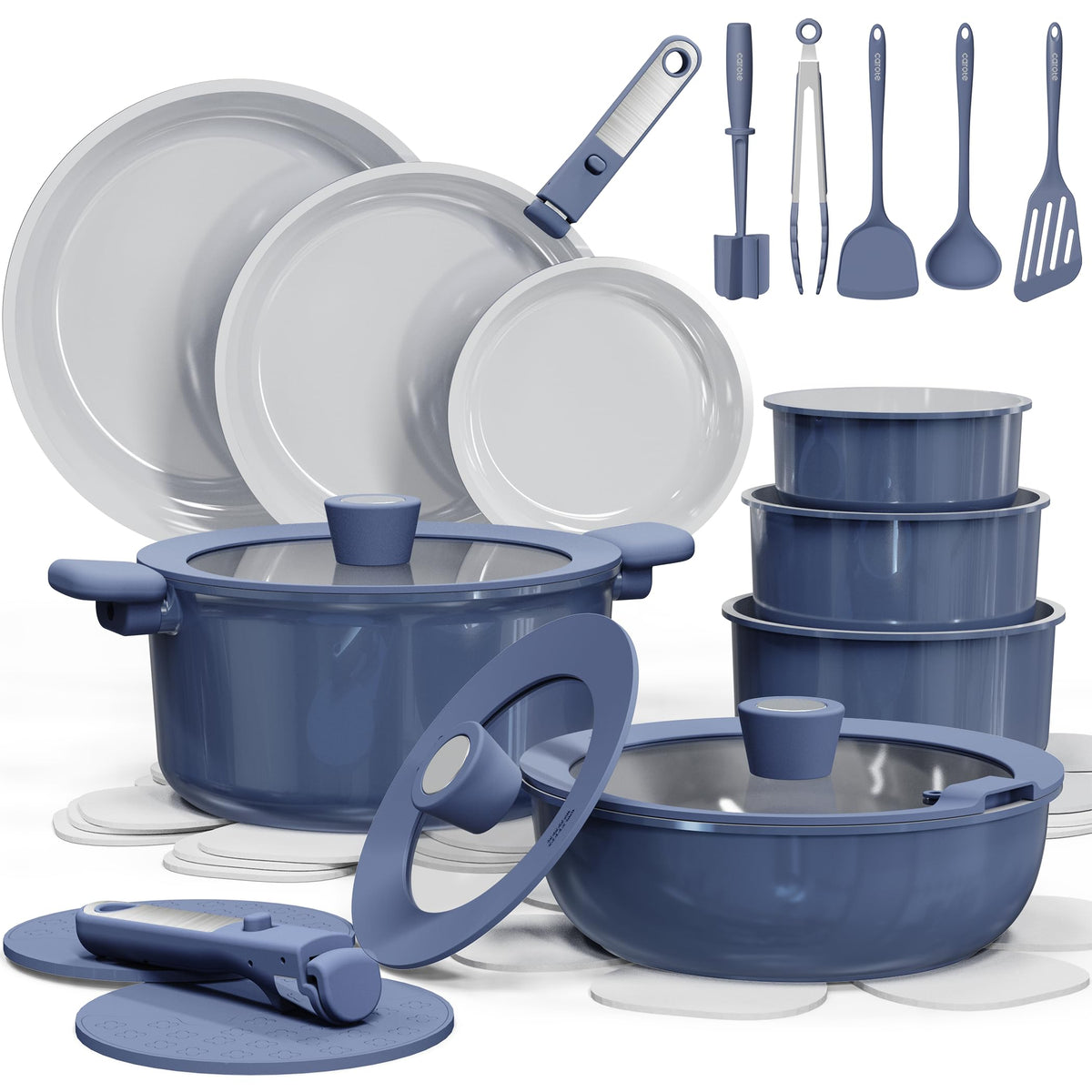 CAROTE 27-piece cookware on stove shows the nonstick surface for easy release.