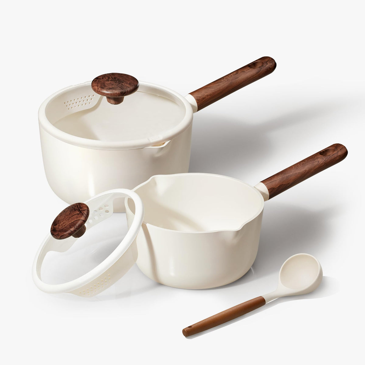 CAROTE 2qt saucepan with lid shows compact design for quick heating and easy pouring