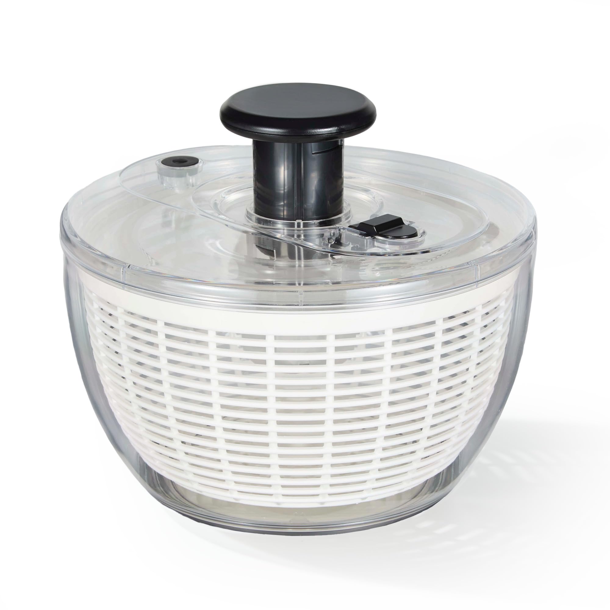 CAROTE 3.8qt salad spinner with transparent bowl for easy viewing and thorough washing.