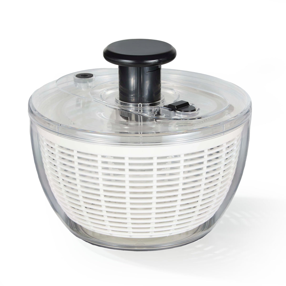 CAROTE 3.8qt salad spinner with transparent bowl for easy viewing and thorough washing.
