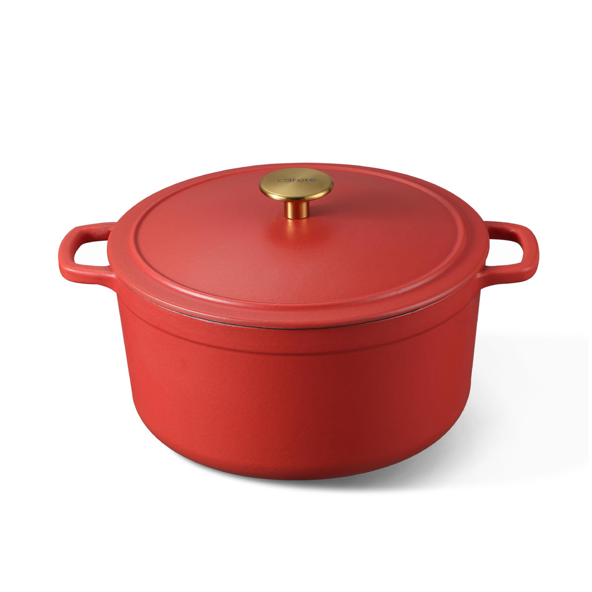 CAROTE 5QT enameled Dutch oven with red lid on stove for versatile family cooking