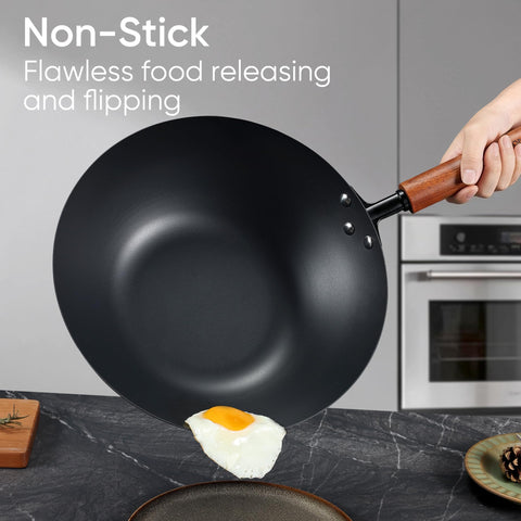 CAROTE lightweight carbon steel wok aids easy flipping at high heat.
