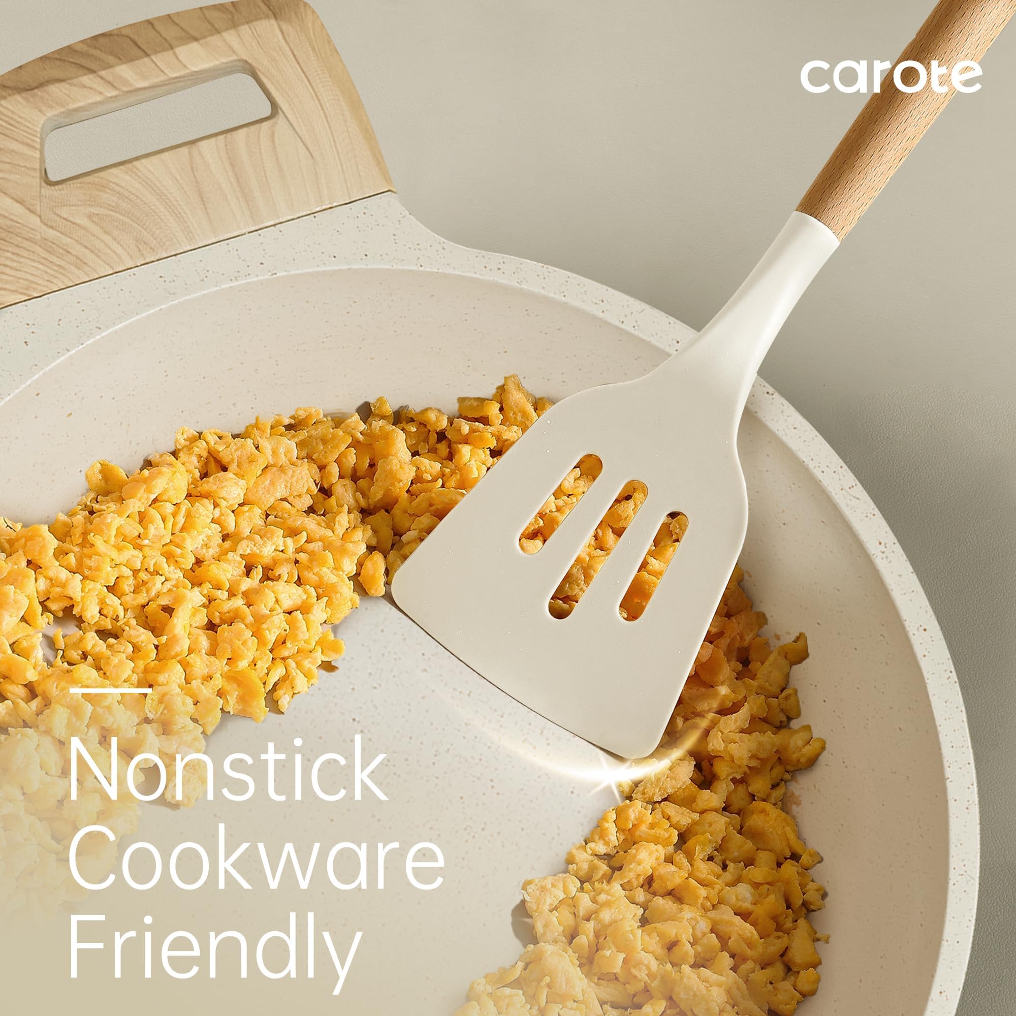 CAROTE round silicone spatula in cream for delicate flips.