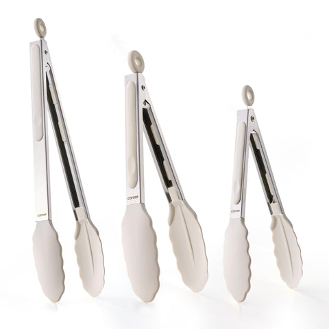 CAROTE 7-inch tongs with silicone tips for gentle nonstick cooking.