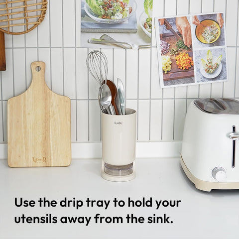 Carrotez beige utensil drying holder made with odor-resistant plastic.