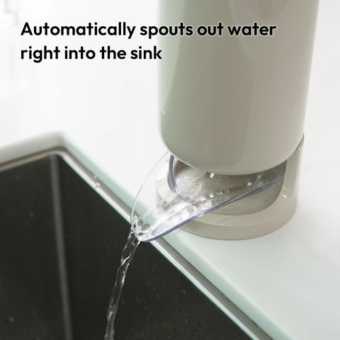 Carrotez utensil drying holder with circular drip tray for tabletop use.