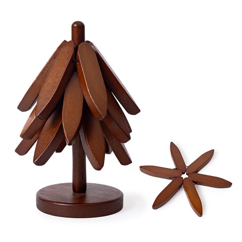 Casa/Legno trivet stand stored like a Christmas tree saves space.