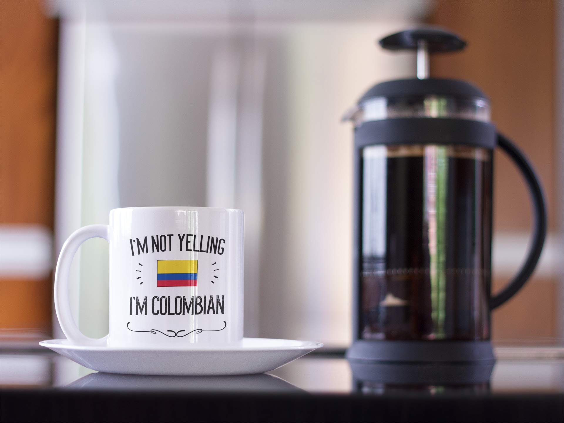 Casitika Colombia Pride mug in hand, ideal for daily coffee rituals