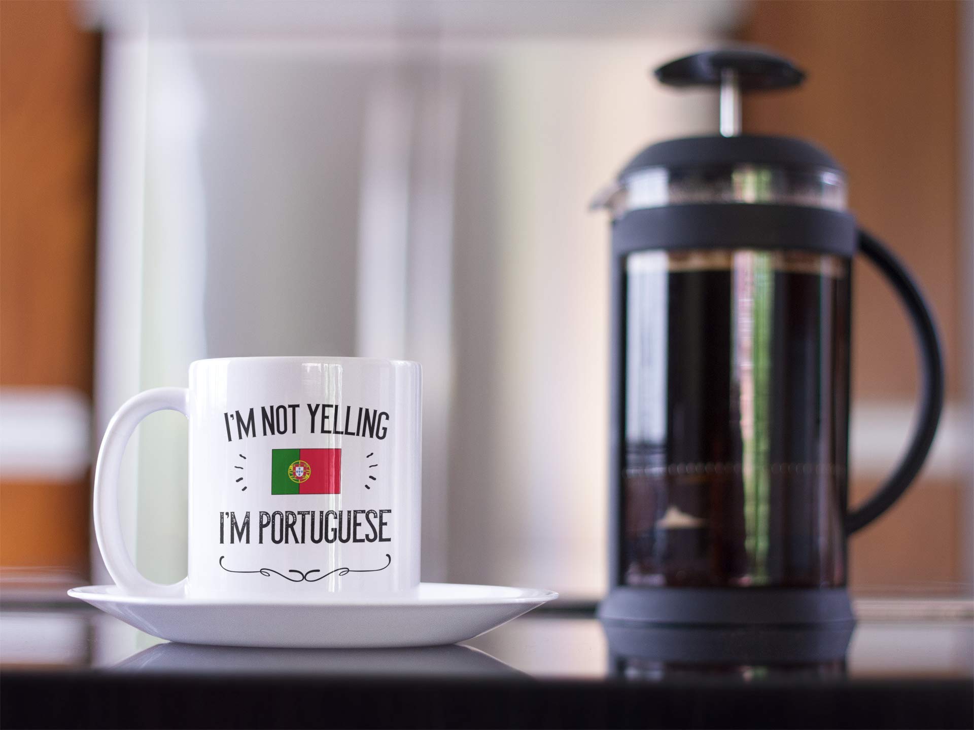 Casitika Portugal Pride mug held in hand highlighting comfortable handle.