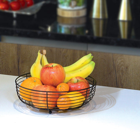 CAXXA fruit vegetable snack storage basket supports visible organization on the counter.