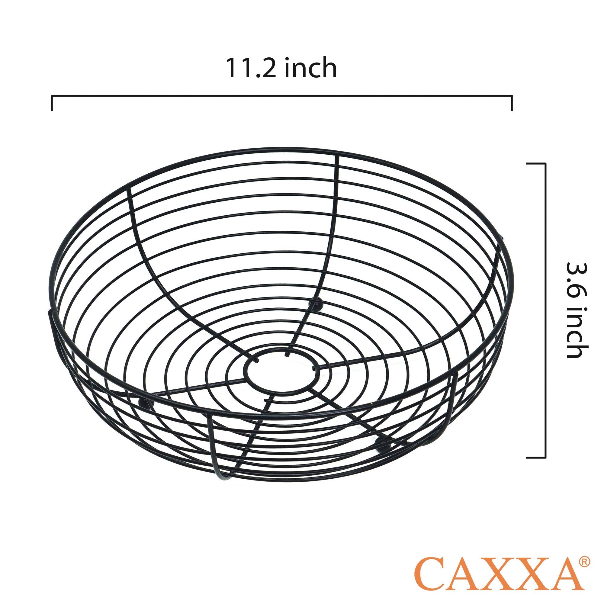 CAXXA matte black wire basket enhances kitchen decor while keeping produce organized.
