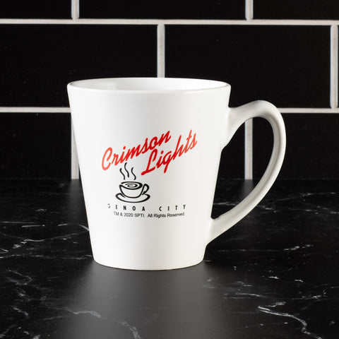 Genoa City coffee moment with white ceramic CBS mug, perfect for fans.