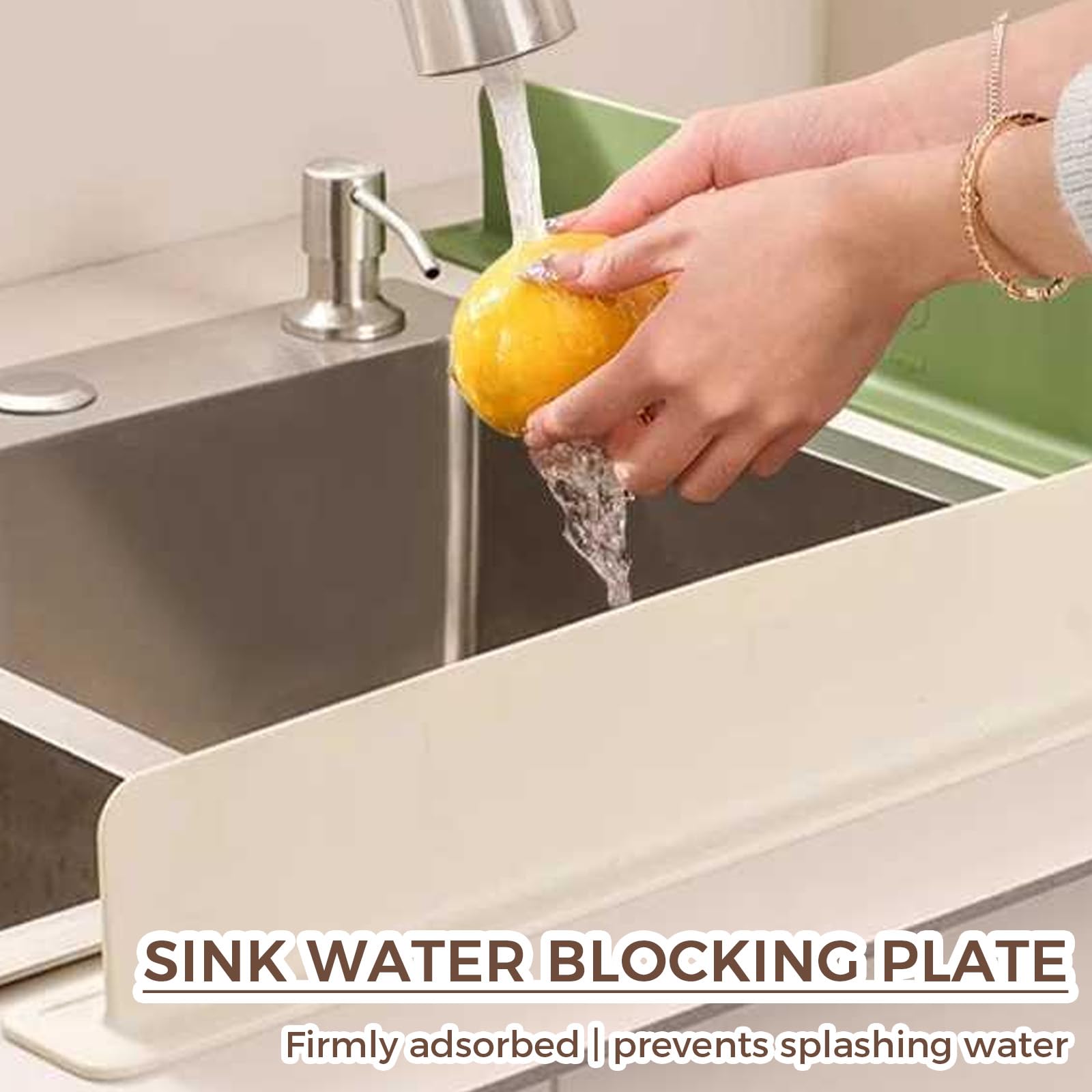 Splash guard installed on a kitchen sink showing secure suction.