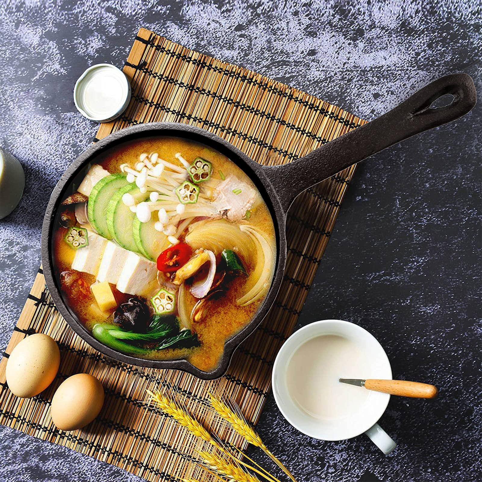 Cedilis long-handle basting pot offers sturdy control during grilling sessions.