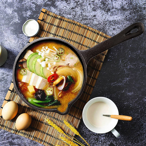 Cedilis long-handle basting pot offers sturdy control during grilling sessions.