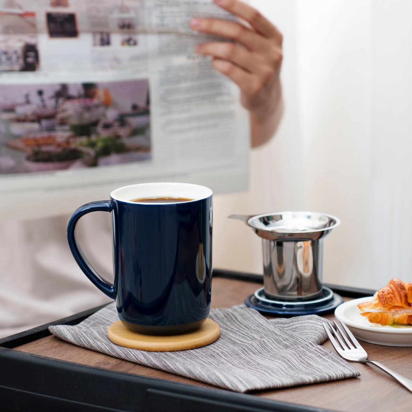 CEEFU tea mug in-use with loose-leaf tea at home.