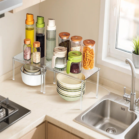 Celsisignis acrylic stackable shelves on countertop for extra levels and organized storage.