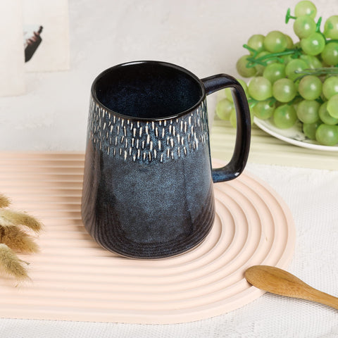 Ceraozmus mug ready for microwave reheating of beverages.