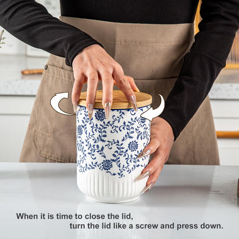 Open canisters demonstrate wide mouths for easy scooping.