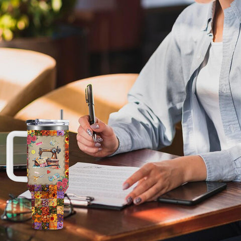 CGMIBAS tumbler keeps beverage within reach during late-night sewing.