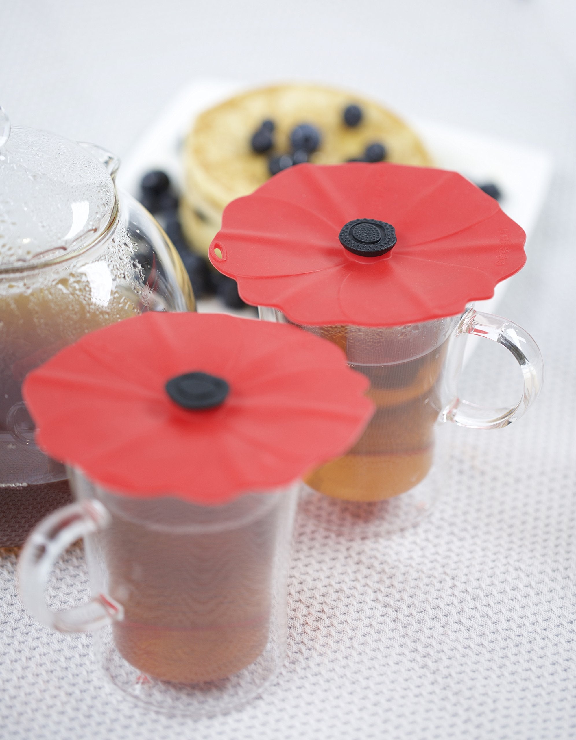 Close-up of Charles Viancin Poppy lid sealing a glass rim