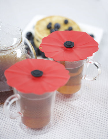 Close-up of Charles Viancin Poppy lid sealing a glass rim