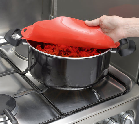 Charles Viancin Poppy lid on stovetop-friendly pot demonstrates heat resilience for cooking