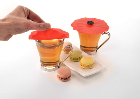 Charles Viancin Poppy silicone lid on a ceramic mug to protect from spills
