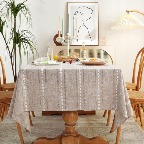 Chassic tablecloth with hemstitch in light coffee for a clean dining look.
